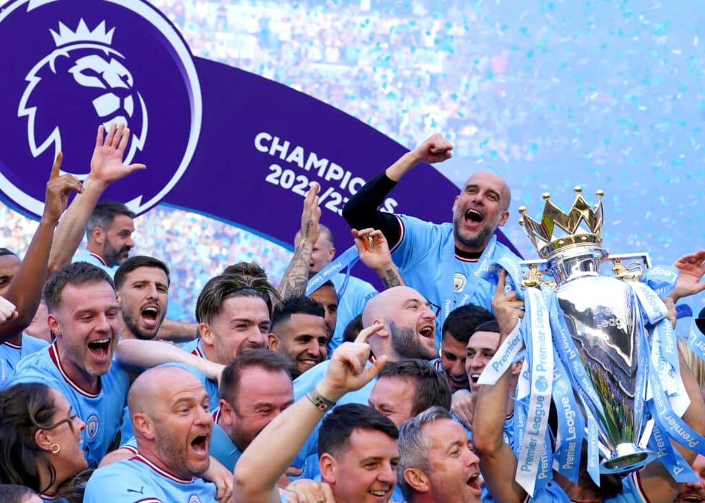 Pep Guardiola celebrates winning the 2022-23 title