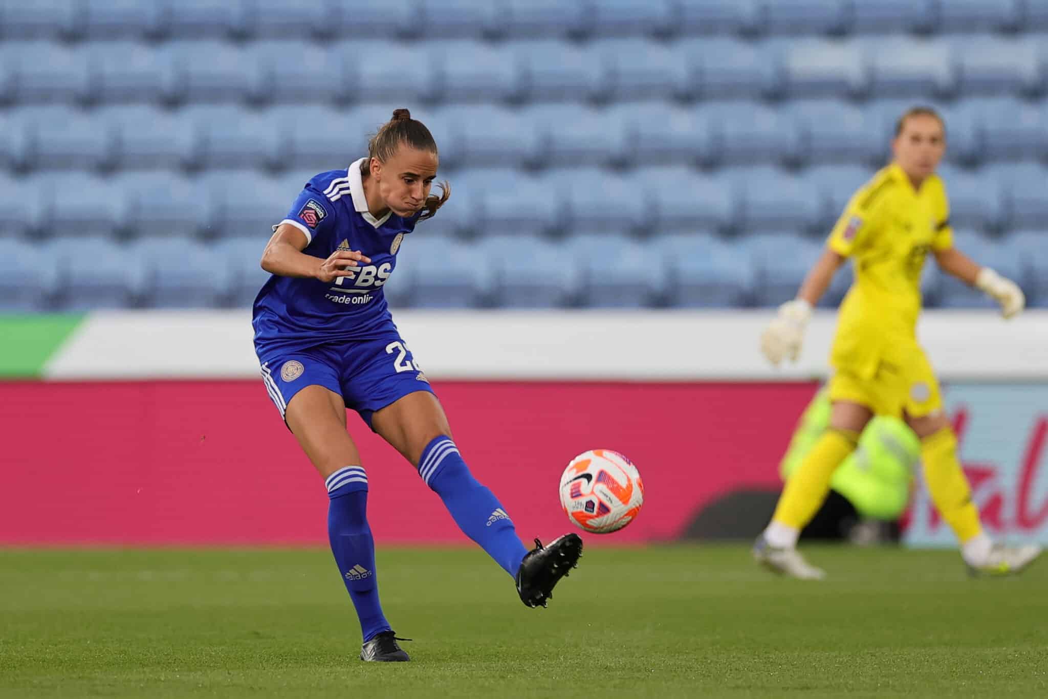 Ashleigh Plumptre plays the ball forward for Leicester City