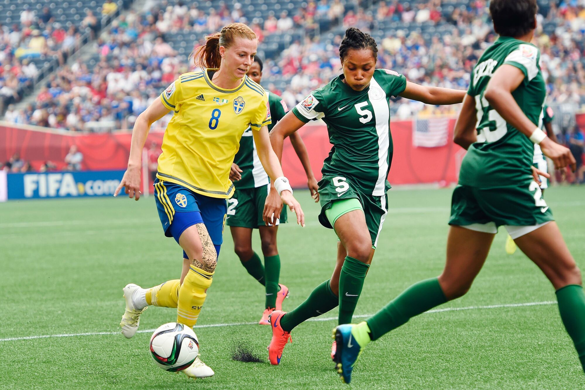 Onome Ebi tackles for the ball