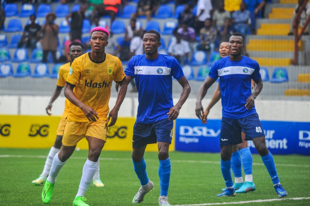 NPFL champions Enyimba players looking to defend a corner