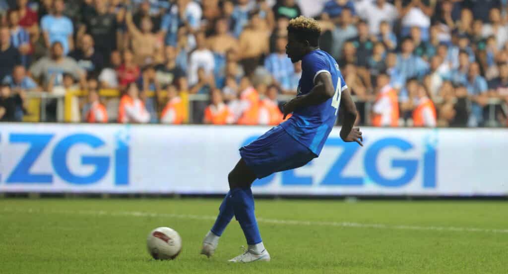 Tolu Arokodare scores the decisive penalty against Adana