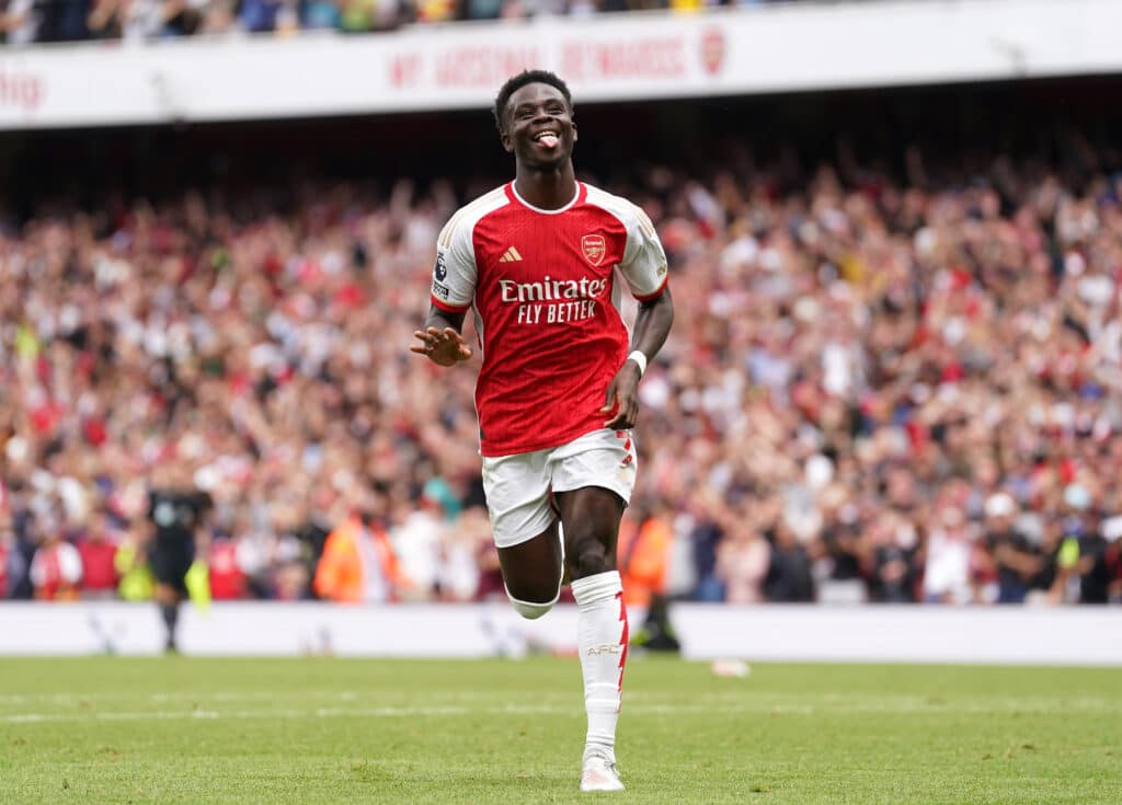 Bukayo Saka celebrates scoring a great goal for Arsenal