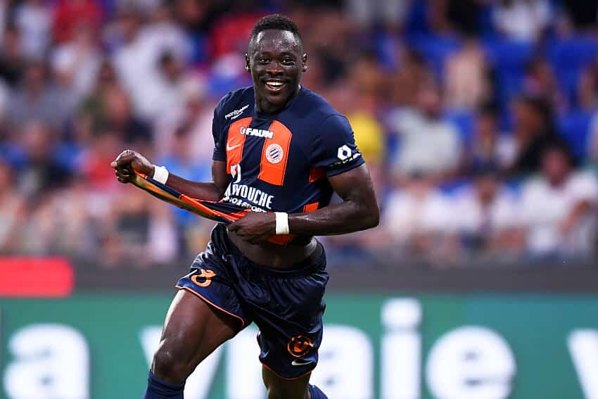 Akor Adams in celebratory mood after scoring for Montpellier