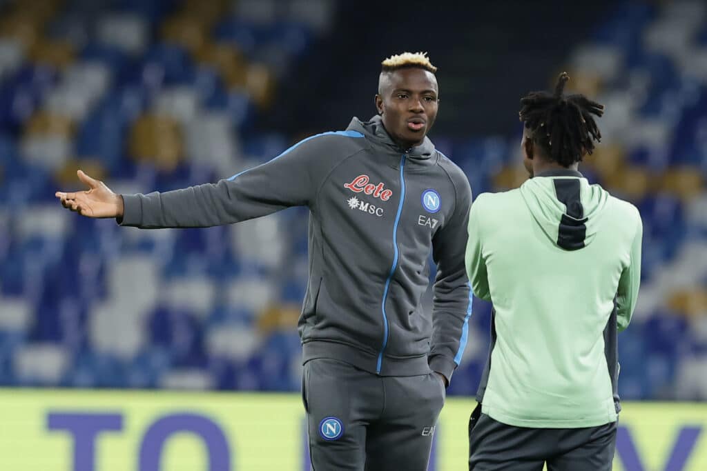 Super Eagles star striker Victor Osimhen with a teammate