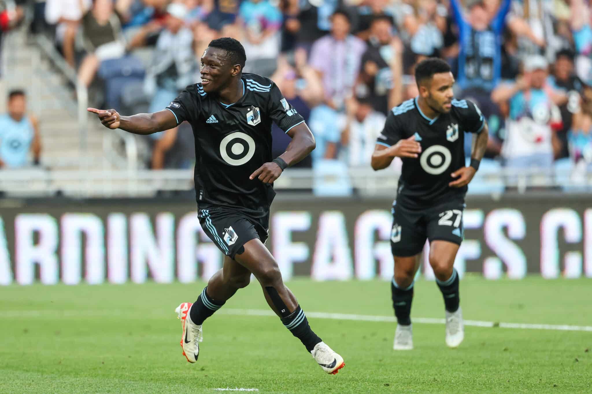 ta United forward Bongokuhle Hlongwane (21) celebrates his goal against the Toluca 