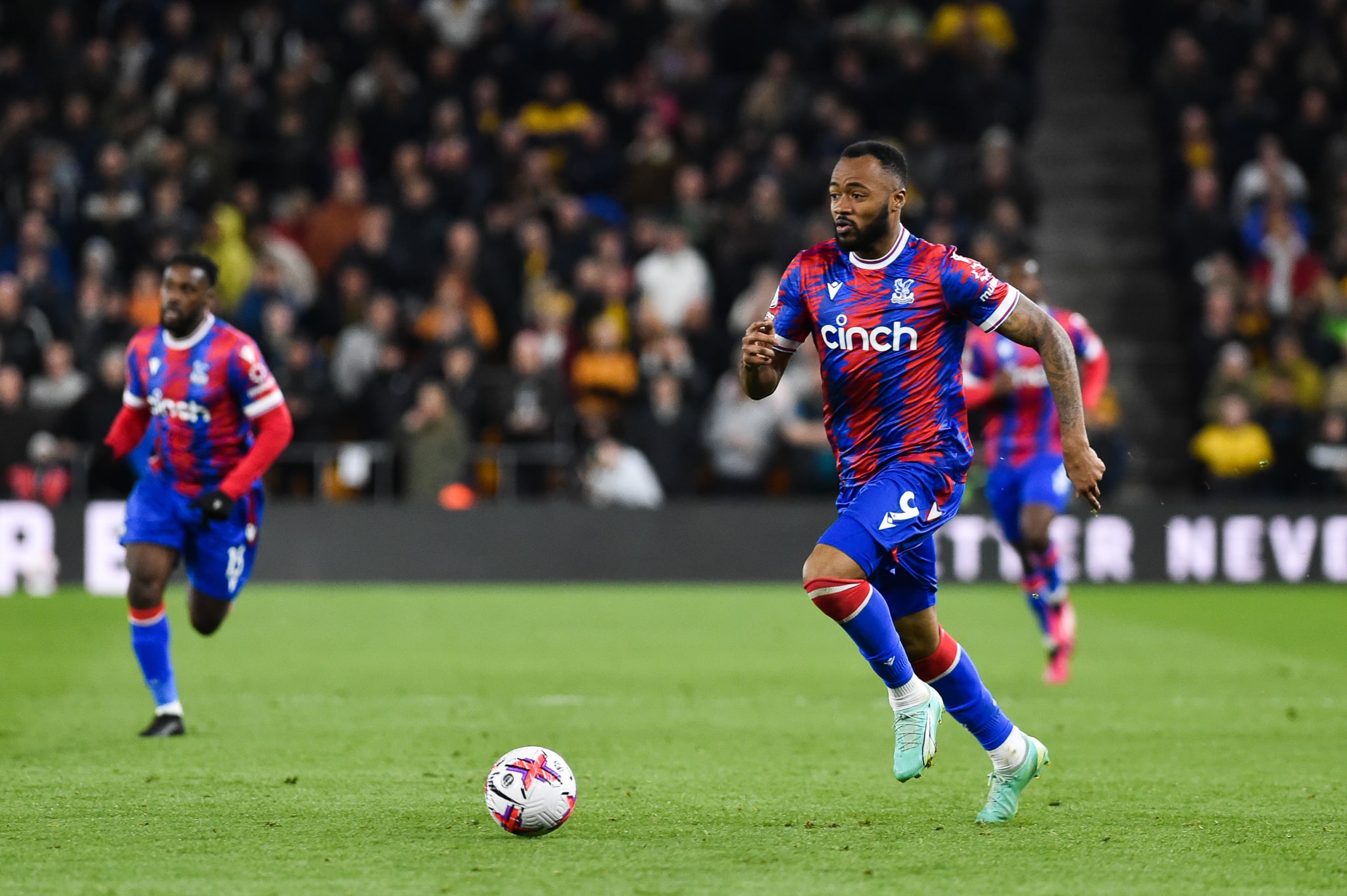  Jordan Ayew of Crystal Palace runs with the ball