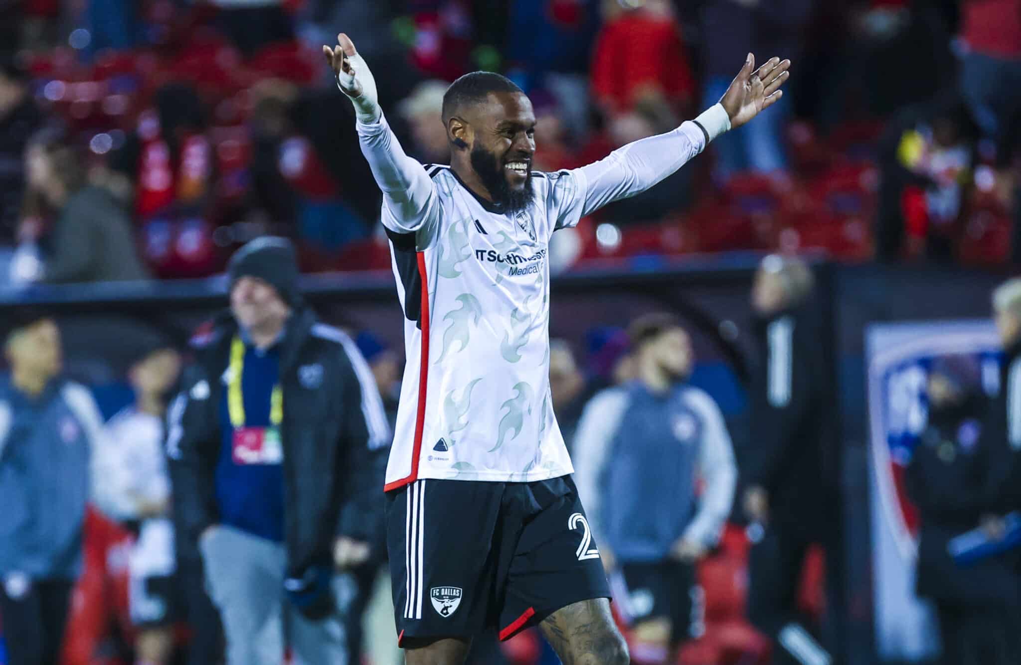 Sebastien Ibeagha celebrates scoring
