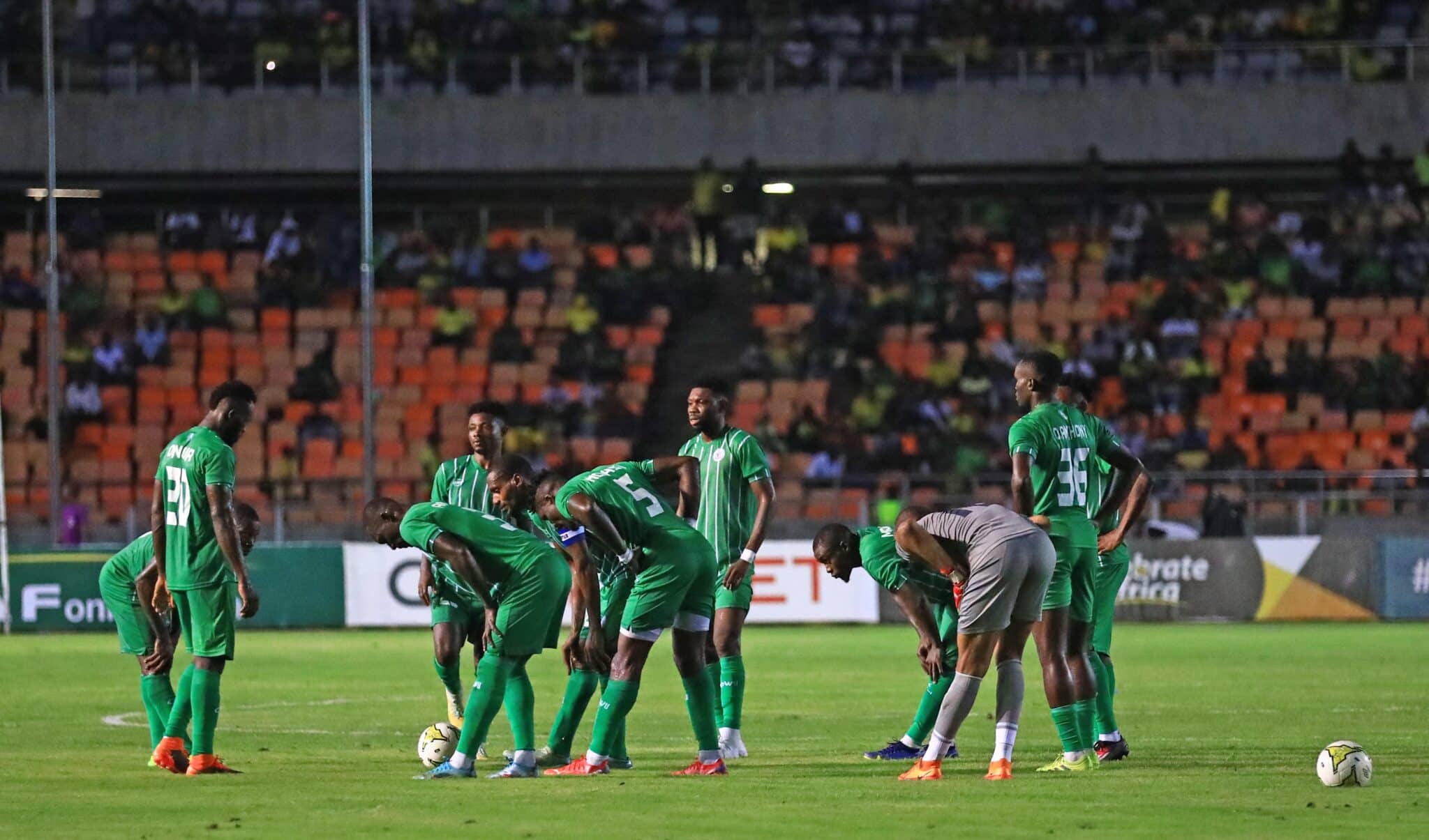 Rivers United players warm up