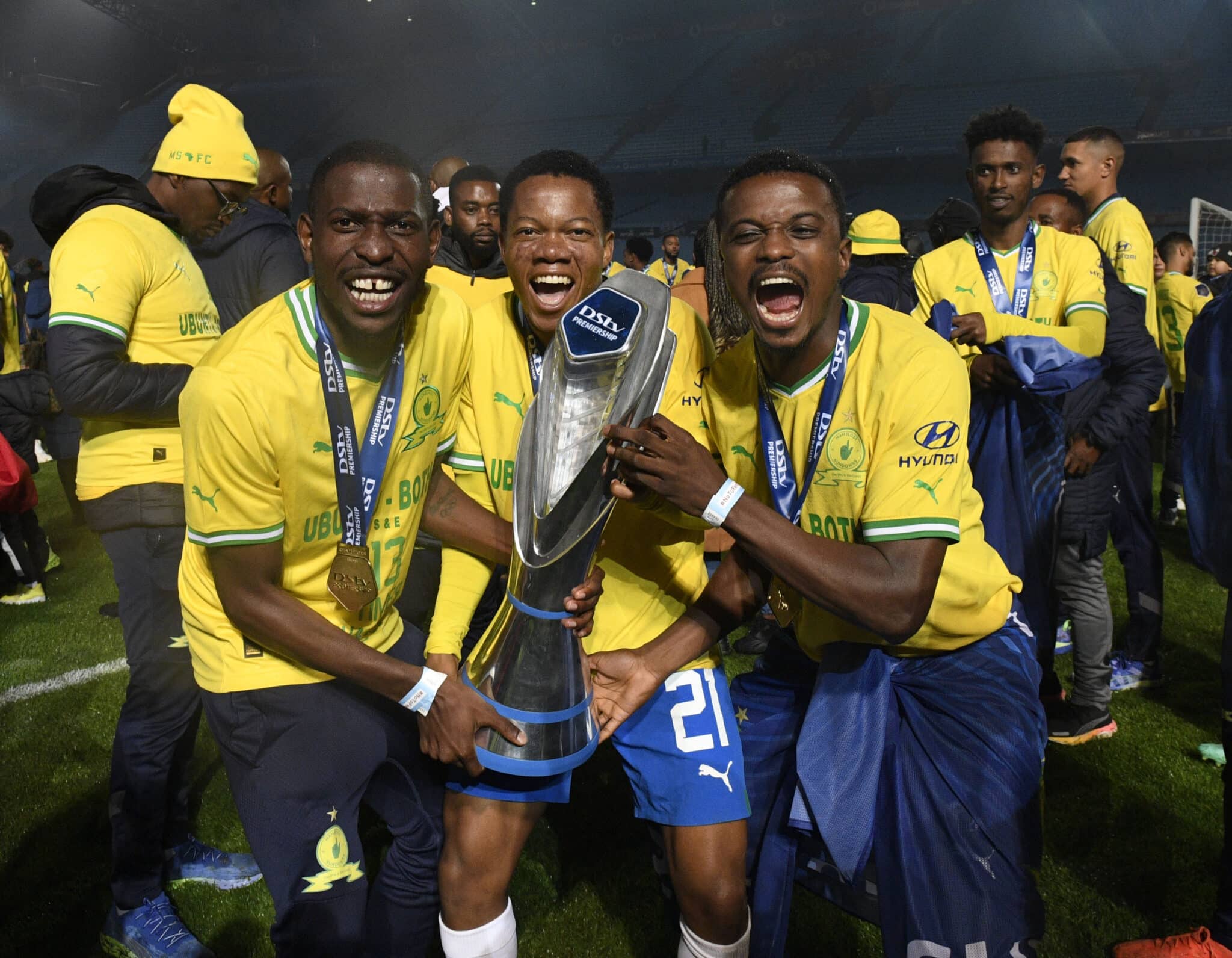 Aubrey Modiba, Sphelele Mkhulise and Teboho Mokoena of Mamelodi Sundowns celebrate during the DStv Premiership 