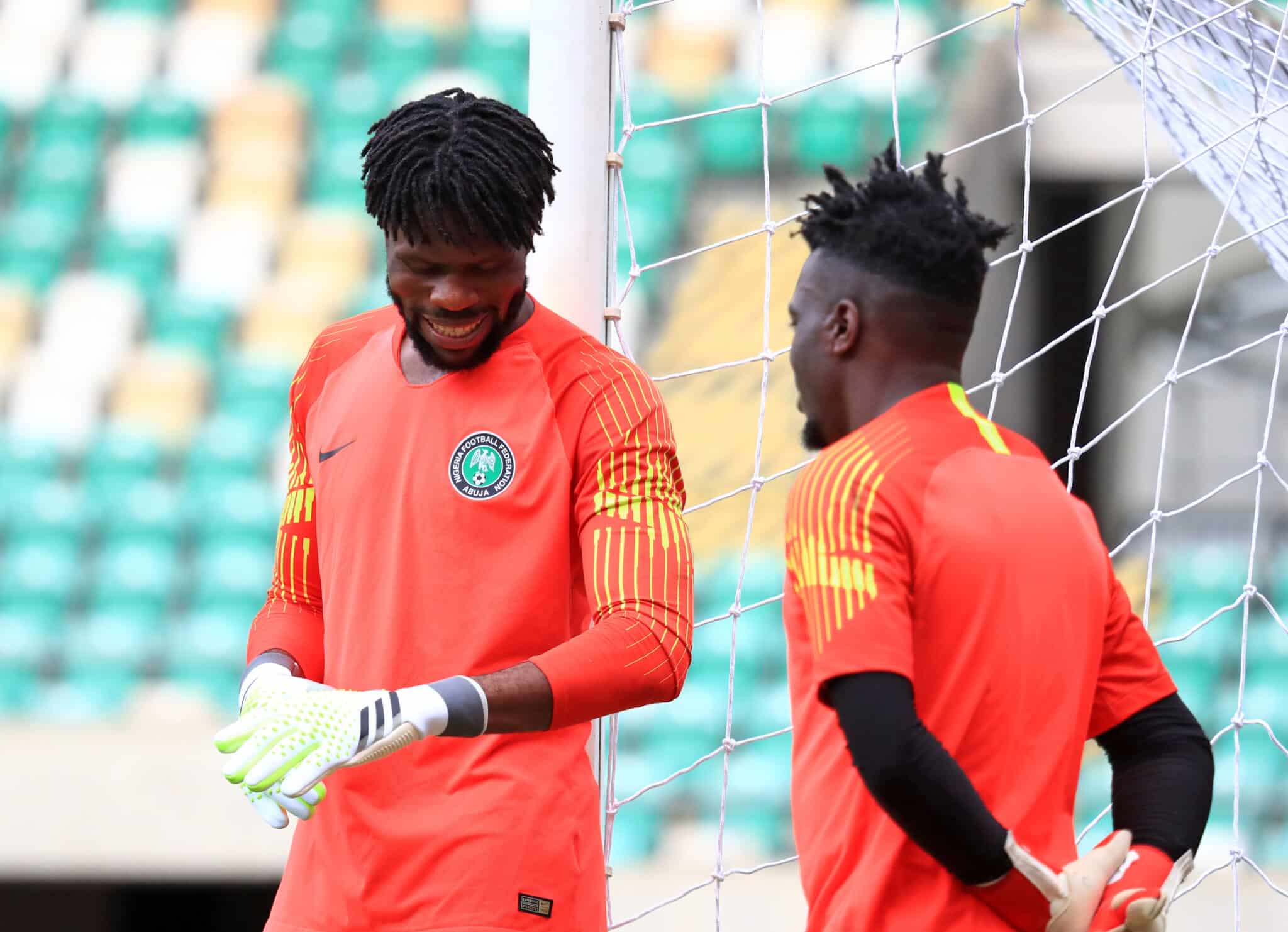 Adebayo Adeleye chatting with Francis Uzoho