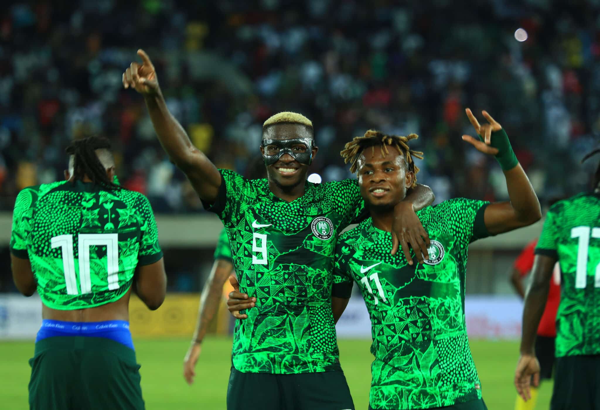 Victor Osimhen of Nigeria celebrates with goalscorer Samuel Chukwueze