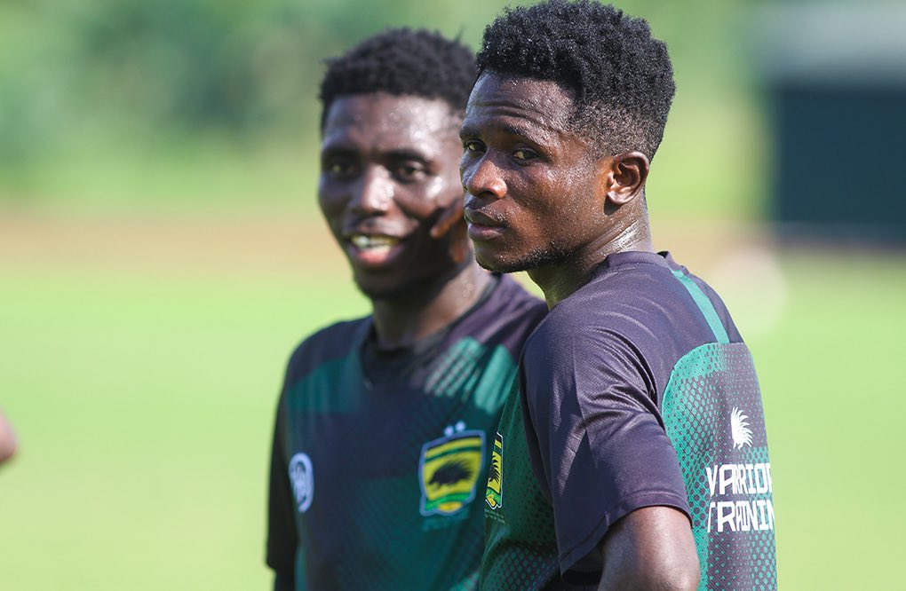 Two Asante Kotoko players while training