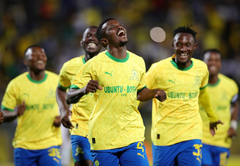 Tebogo Mokoena of Mamelodi Sundowns celebrates goal with teammates