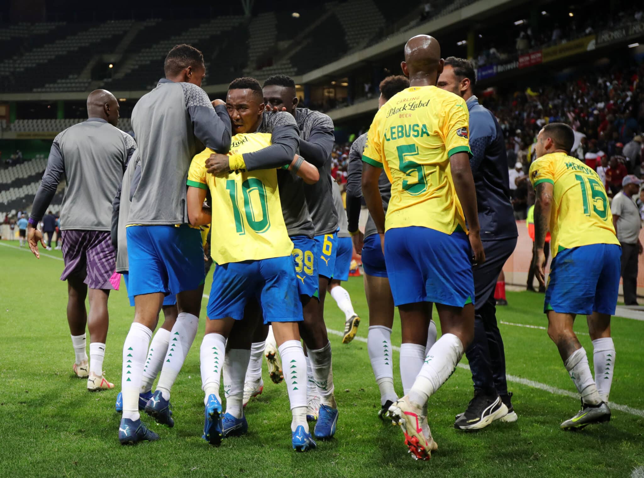 Mamelodi Sundowns players celebrate with Gaston Sirino
