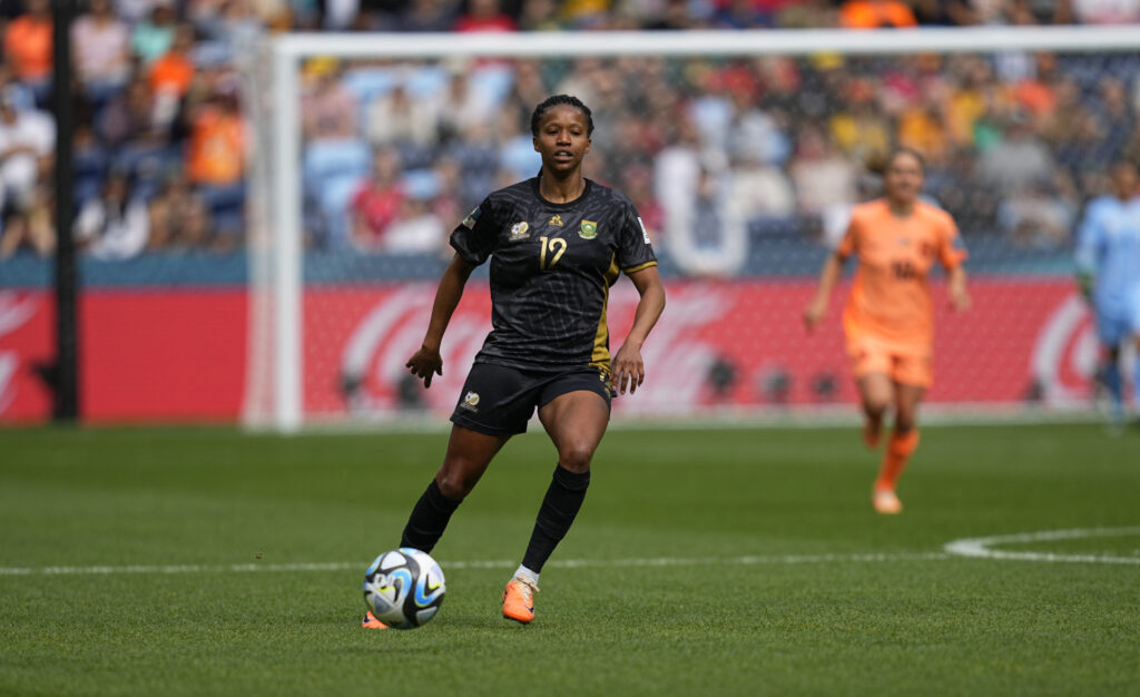 Jermaine Seoposenwe (South Africa) controls the ball during a game