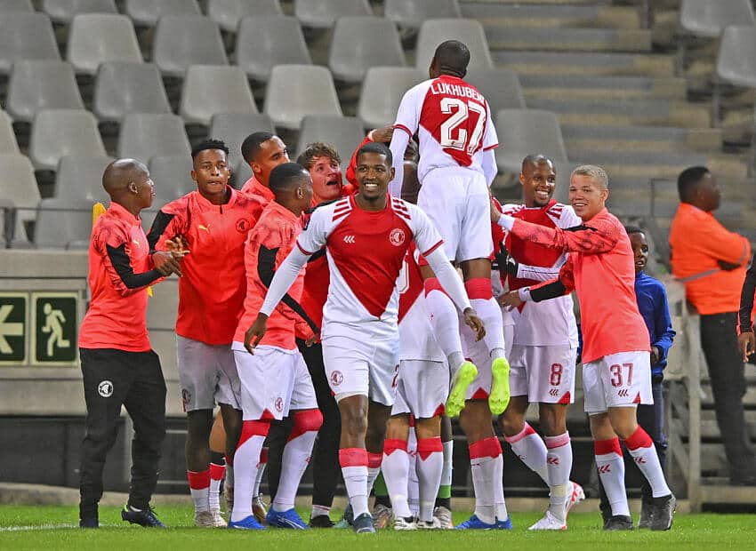 Cape Town Spurs players celebrate goal