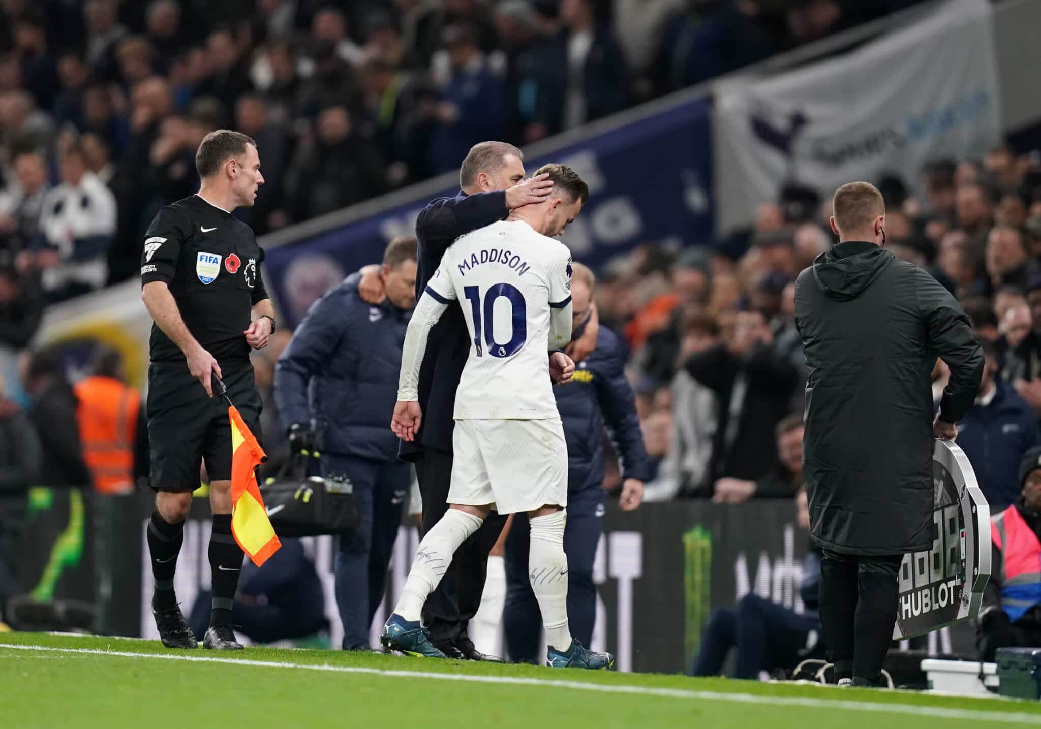 Tottenham Hotspur's James Maddison goes off injured during the Premier League