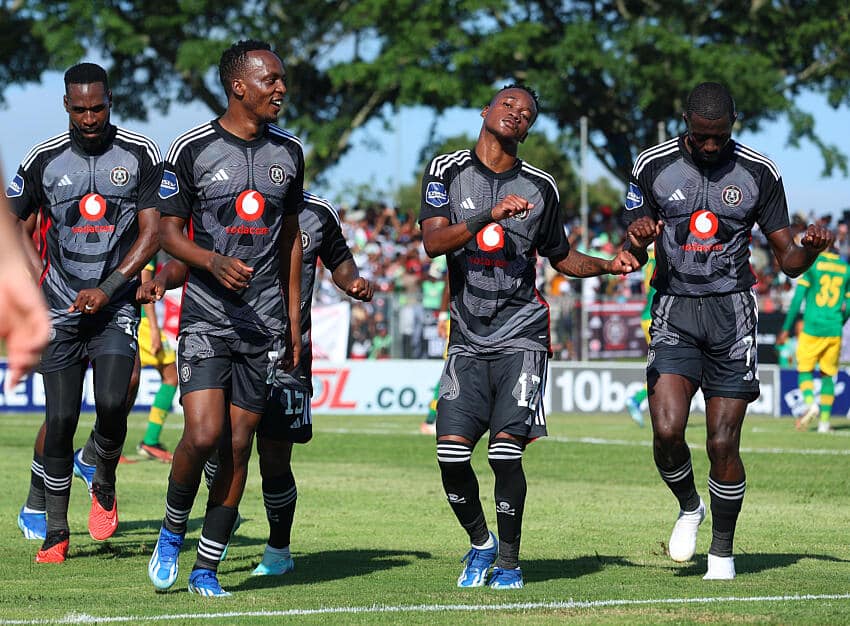 Orlando Pirates players celebrate scoring a goal