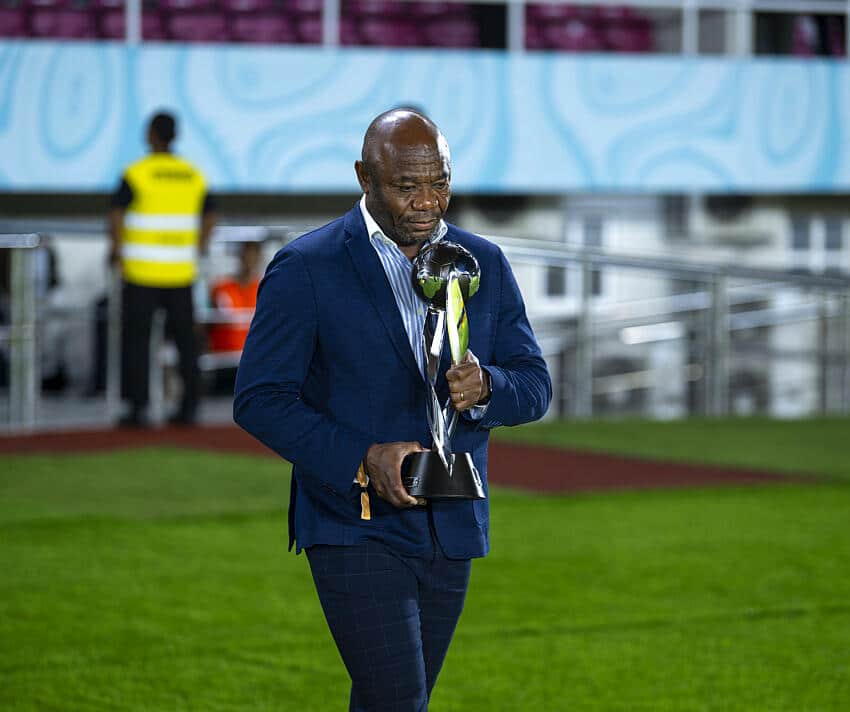 Emmanuel Amuneke with U-17 World Cup trophy