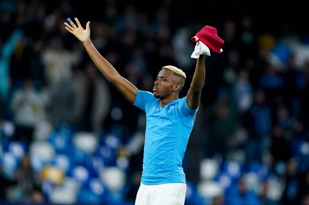 Victor Osimhen of SSC Napoli celebrates the victory at the end of the Uefa Champions League match