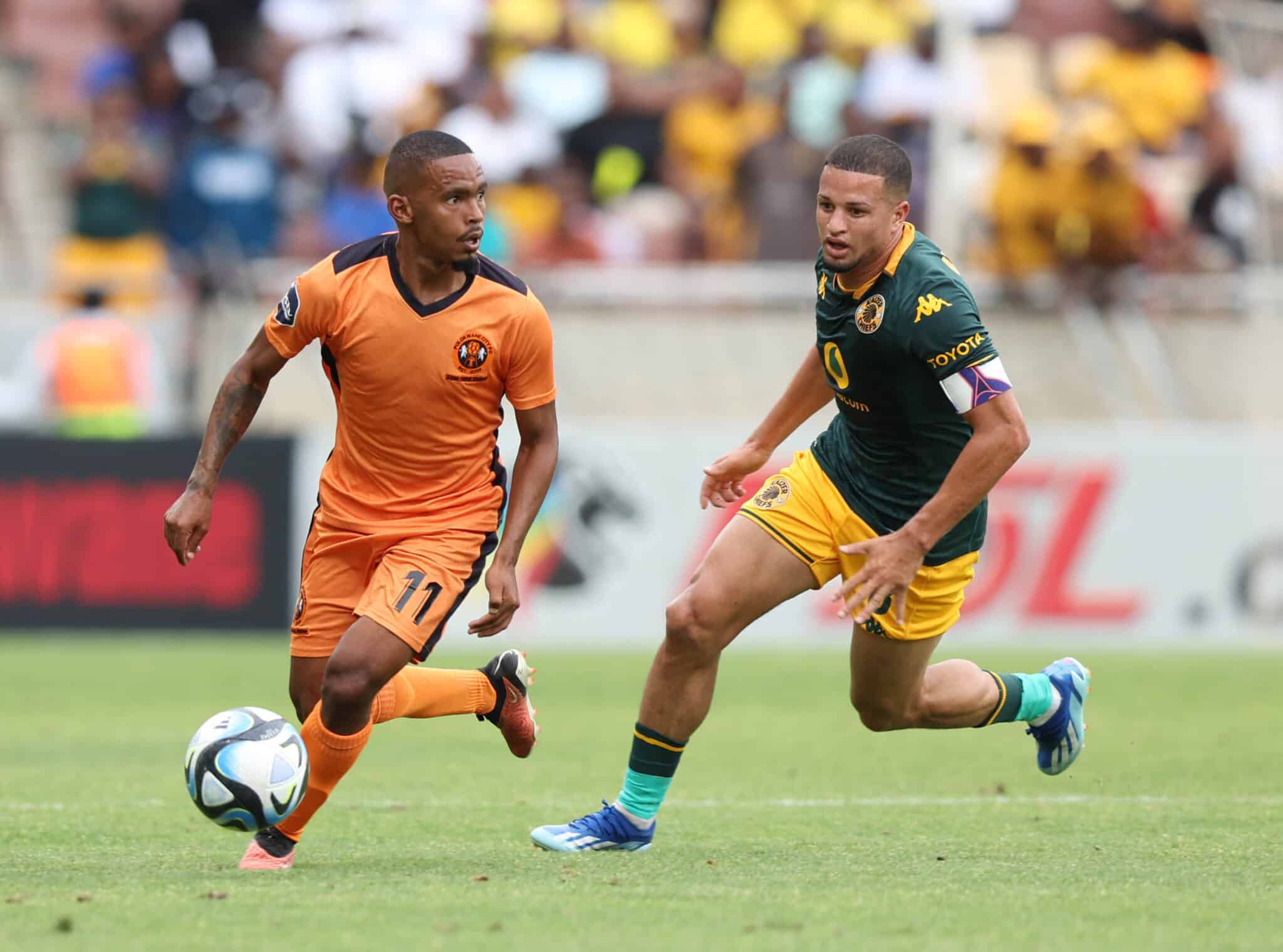 Oswin Appollis of Polokwane City challenged by Yusuf Maart of Kaizer Chiefs 