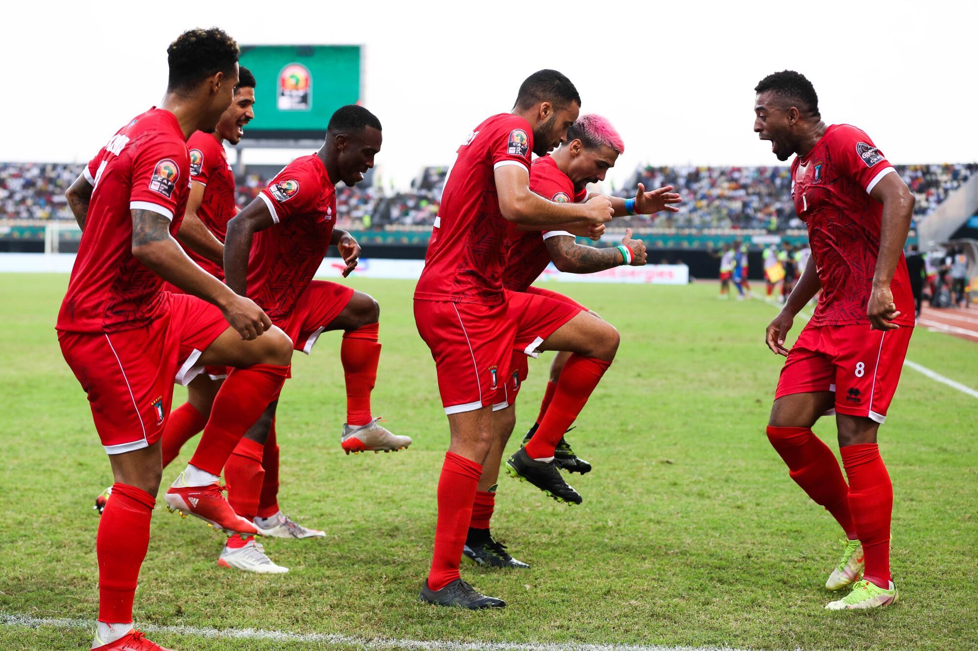 Equatorial Guinea players celebrate scoring a goal