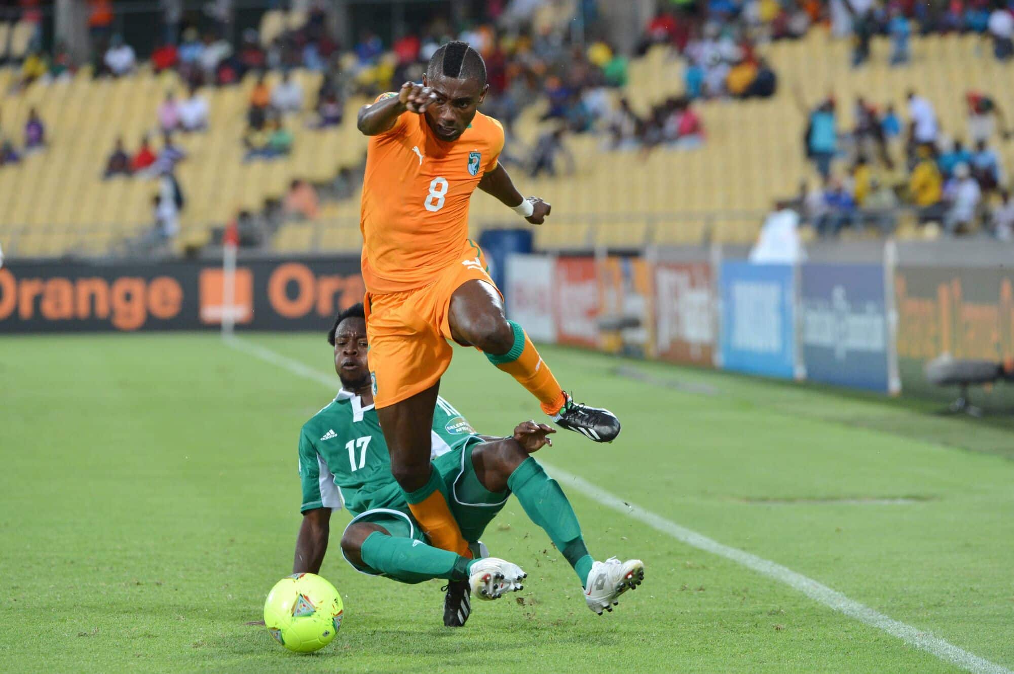 Salomon Kalou and Ogenyi Onazi contend with each other in Super Eagles vs Ivory Coast clash