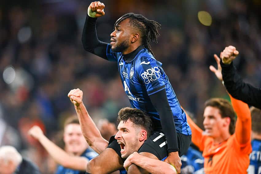 Ademola Lookman celebrates scoring against Bayer Leverkusen 