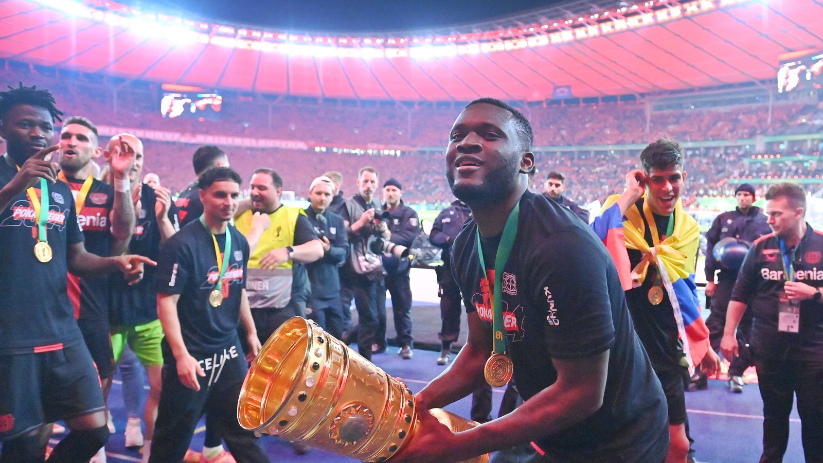 Super Eagles players with a DFB Pokal title
